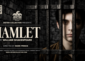 Promotional poster for Jester Collective’s Hamlet at Theatro Technis, showing a young man behind prison bars against a dark stone background.